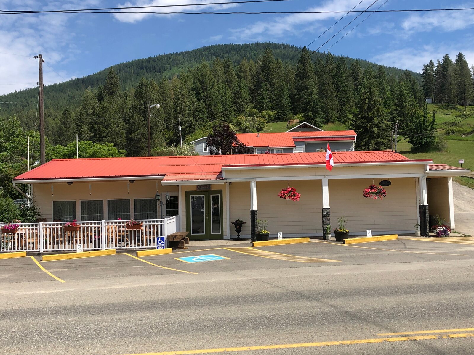 The Bigfoot Cafe building with its red roof on Highway 3, Creston BC
