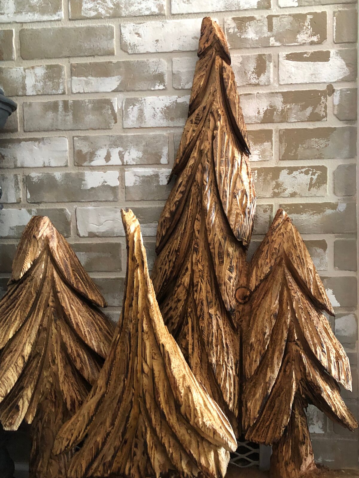 Carved wooden trees by a local maker